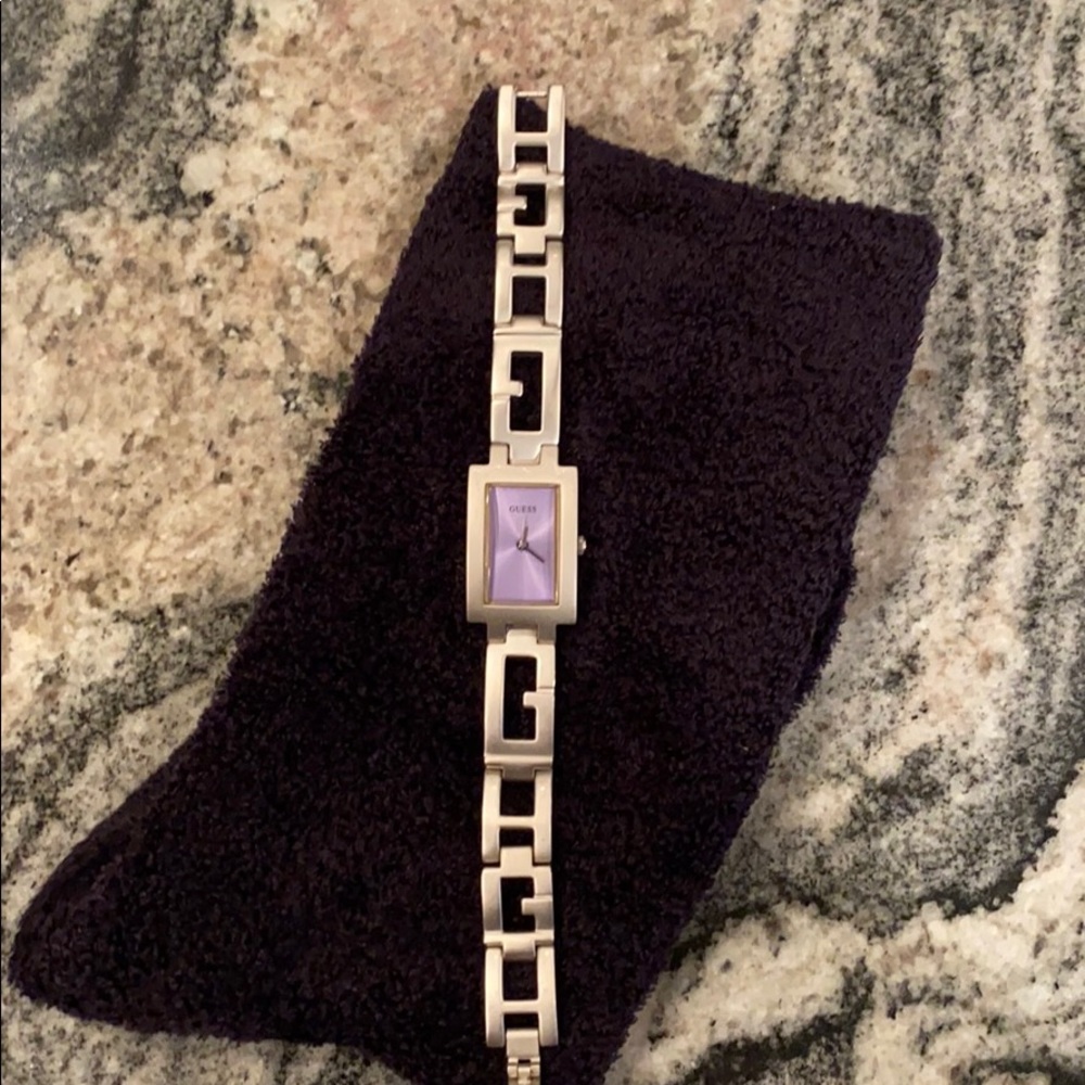 NWT. Guess watch with purple face.